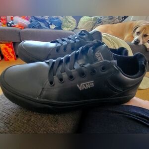 Mens size 7.5 black leather Van's sneakers. Almost brand new. Worn 2 times.